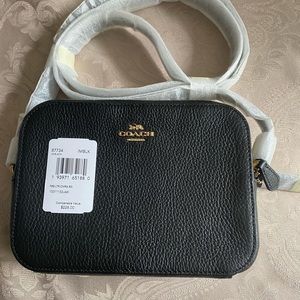Black Coach Camera Bag. Never used. Dimensions in photos. Paid $109.00.